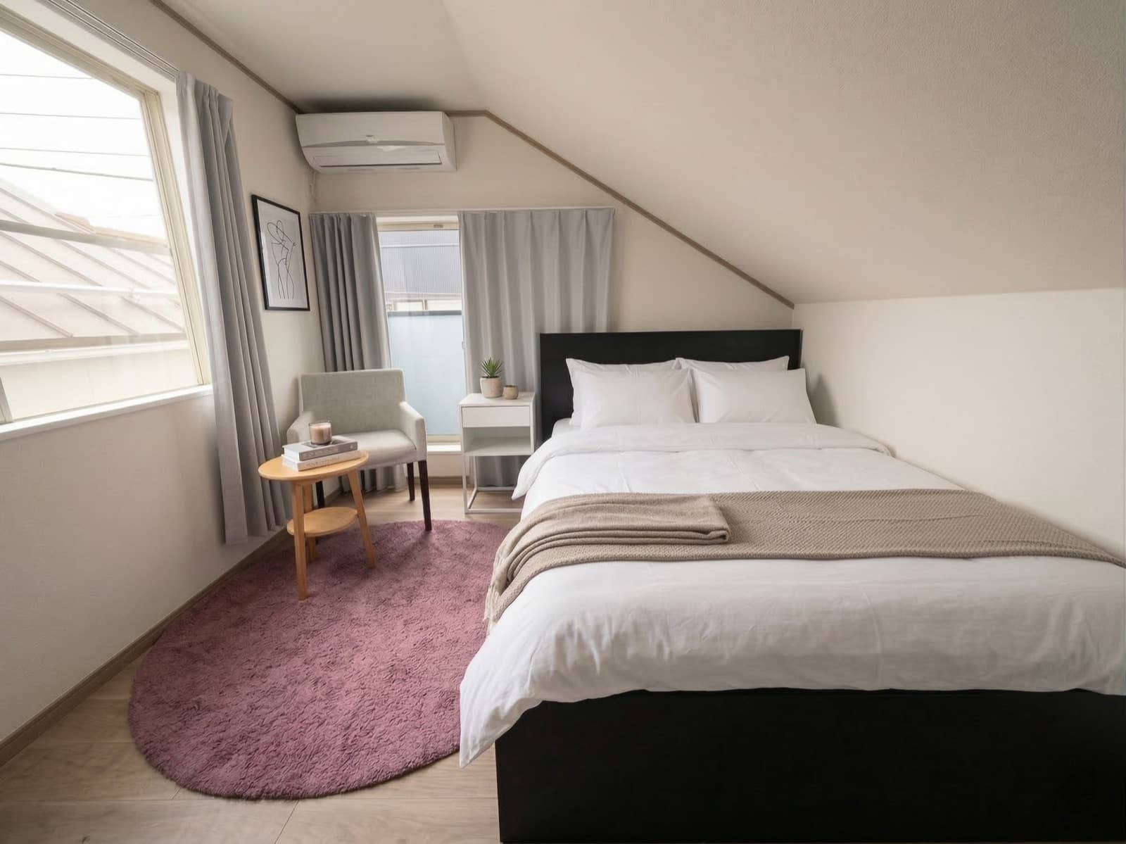 HalfKey furnished bedroom with double bed and reading nook