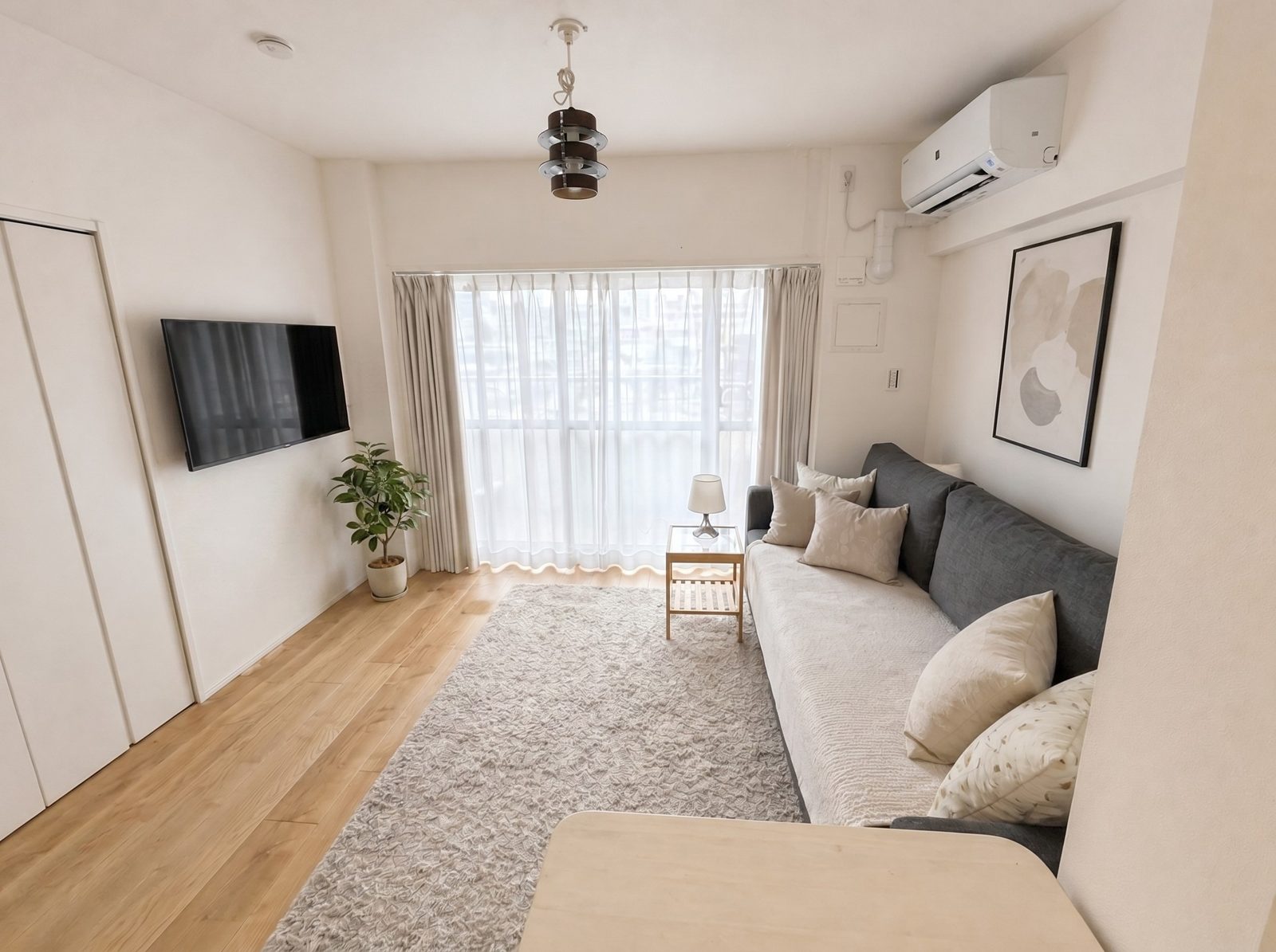 Living room of a furnished HalfKey monthly apartment in Yotsuya, Tokyo